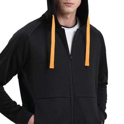 "Assorted zip hoodie in Black orange model posed for custom logo printing – NS Promo sports uniform"