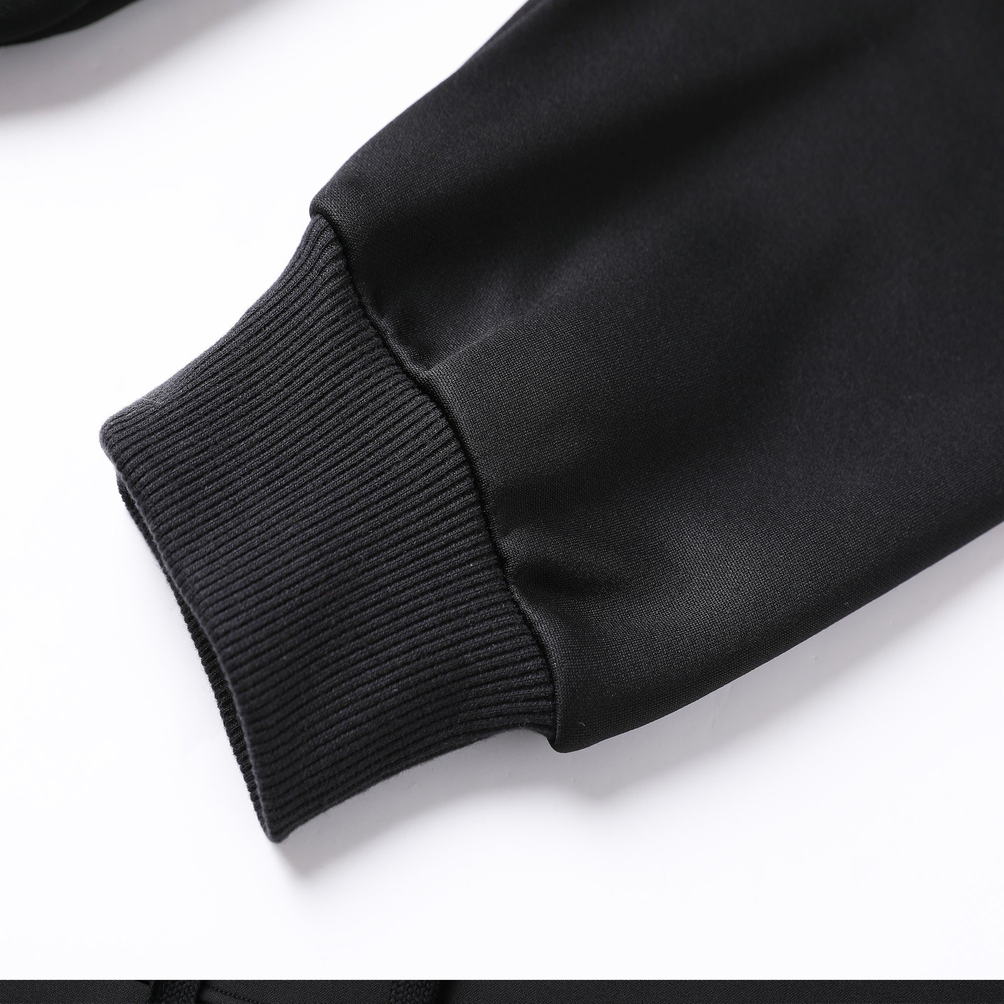 "Assorted hoodie sleeve detail close-up ready for custom printing – NS Promo tradie uniform"